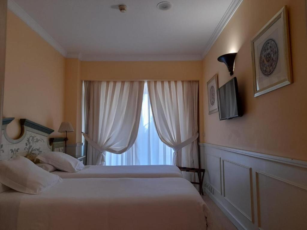 古达平精品公寓酒店 马尔韦利亚 外观 照片