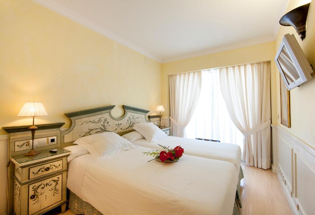 古达平精品公寓酒店 马尔韦利亚 客房 照片